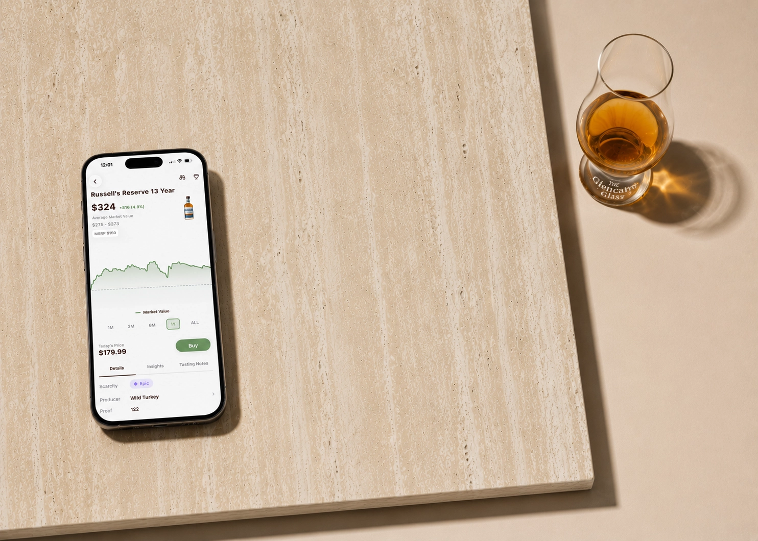 Phone showing BRBNFNDR live market pricing on a stone surface